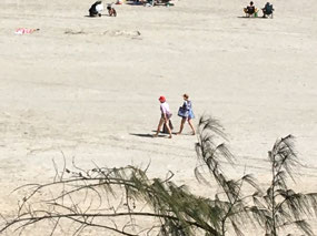John taking photos of us from up the sandhill