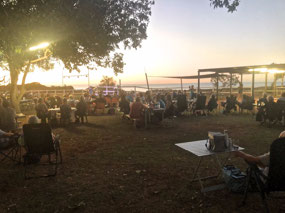 Setting sun and the crowd
