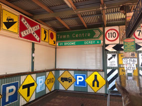 Assortment of signs at Sandfire Roadhouse