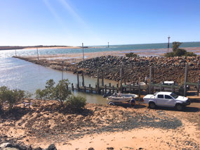 Tide out-getting the boat out