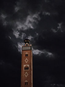 Threatening skies (and a stork nest on the tower)