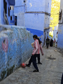 Soccer, even in the narrow streets