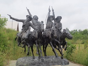 Statue in front of Old Cowtown Museum