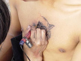 Outdoor and Mobile Tattoo man