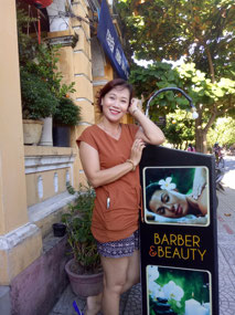 My Le outside her shop