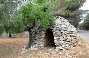 Cairn stone shelter in prehistoric man area
