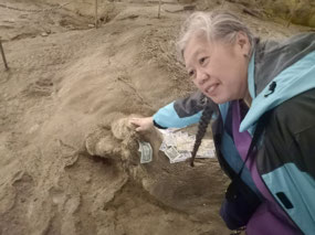 Rubbing the turtle head rock
