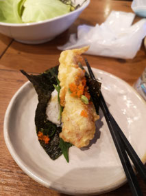 Chicken tempura rolled sushi