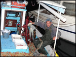 Antonis the young fisherman with his catch