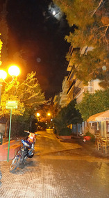 The pedestrian road opposite the entrance