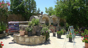 The fountain and little garden in Fyti