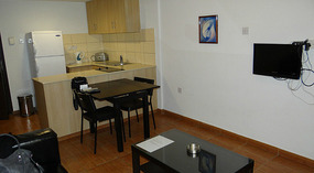 The sitting room and kitchen