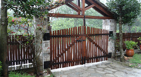 The entrance gates of the villa