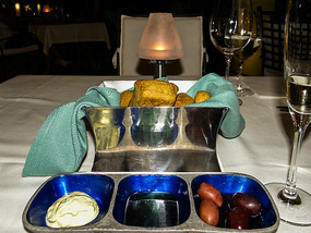 To begin with ...bread, olives a nice dip 