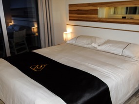The king size bed of room #205