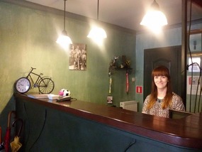 Monika behind the reception desk