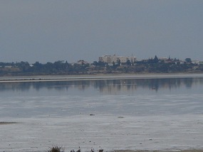 LARNACA REFLECTING IN THE SALT LAKE