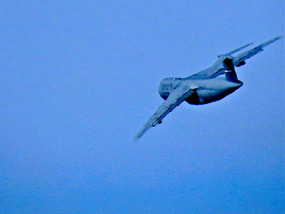 An Air Force transport leaves Travis AFB