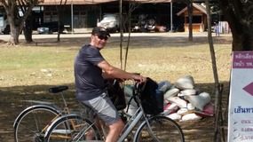 Riding the rickety bikes through town 