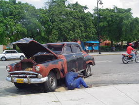 Motor Repairs In The Street.