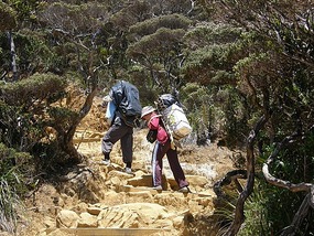 Porters On The Summit Trail.