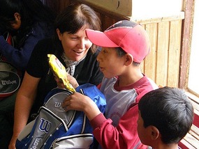 Luis Opens His New Backpack.