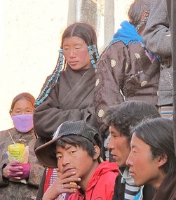 Tibetan Faithful Wait For Temple To Open.