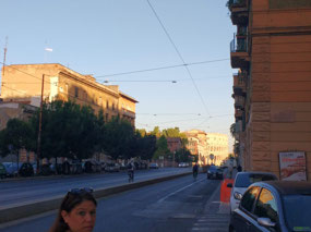 Morning walk to bus stop; Colosseo in distance