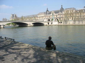 On the banks of the Seine across from the Louvre