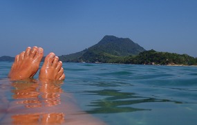 Ten brown toes and a hill