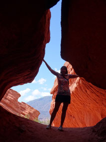 Elenka at the cave keyhole