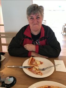 Mouth full of delicious pizza
