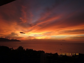 Wonderful sunsets from our balcony in Penang.