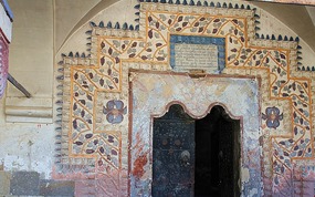 Grape vine design around church door