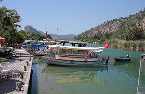 Boats at Dalyan take tourist to ancient site