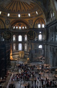 People are dwarfed inside Hagia Sofya