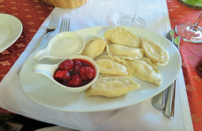 Pelmini with curd and berries