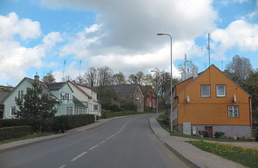Driving through village