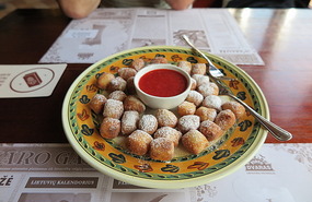 Dumplings with strawberry sauce