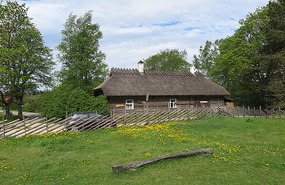 Wooden and thatched cottage
