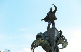 Statue by water
