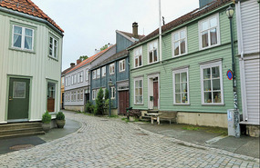 Wooden houses in old town across river