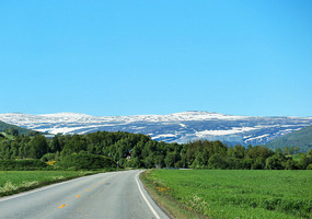 Snow on the mountains as we go south 