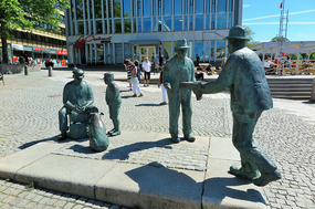 Fisherman sculptures outside church
