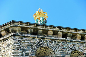 Golden crown on fortress