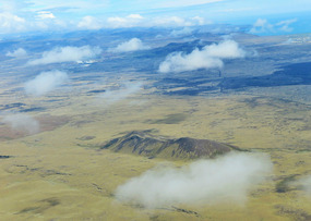 Mountains seeming to pop out of the plain