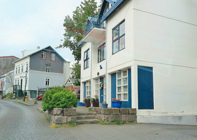Quite a few blue trimmed houses