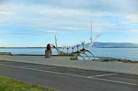 Viking ship sculpture by the shore