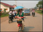 Laos Girl on her Motorbike