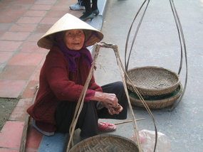 .01  Old Woman in Hoi An